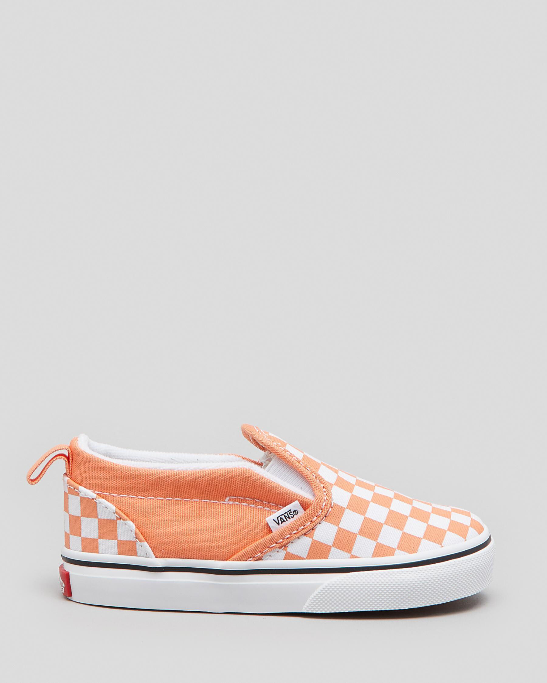 light blue and white slip on vans