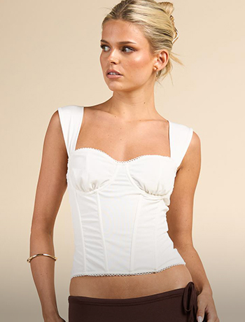 Woman wearing a red top with jeans