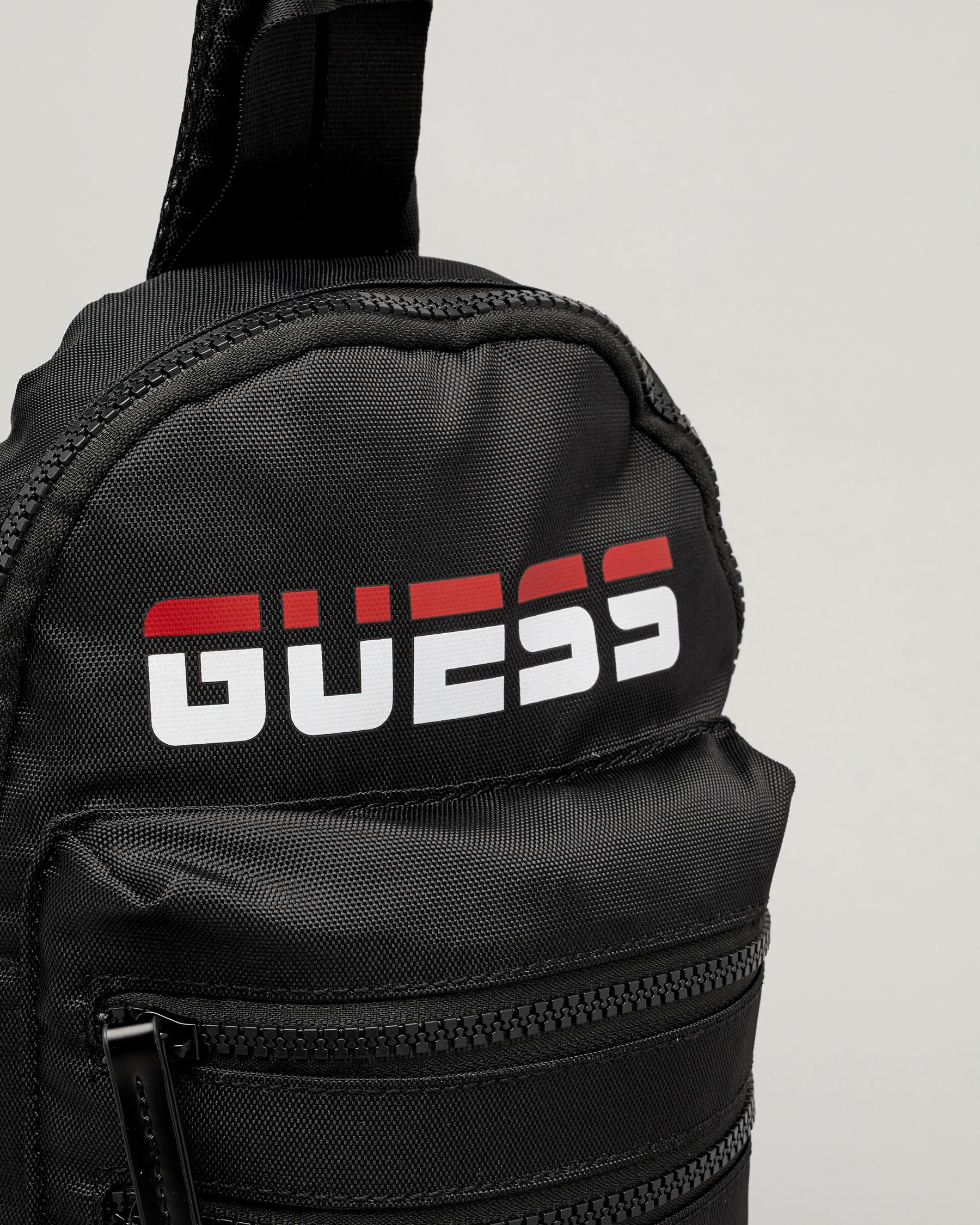 Shop GUESS Jeans Duo Sling Backpack In Black Fast Shipping & Easy