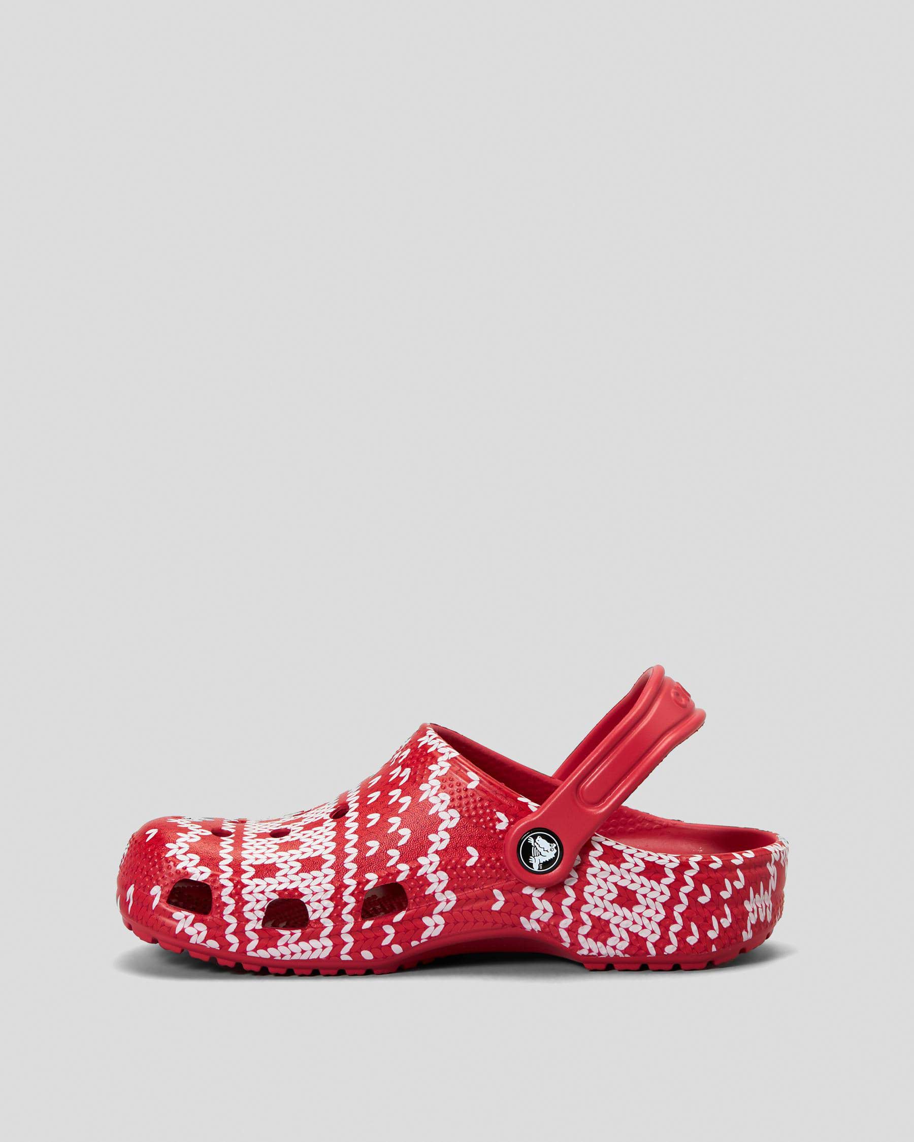 Shop Crocs Kids' Classic Holiday Sweater Clogs In Multi - Fast Shipping ...