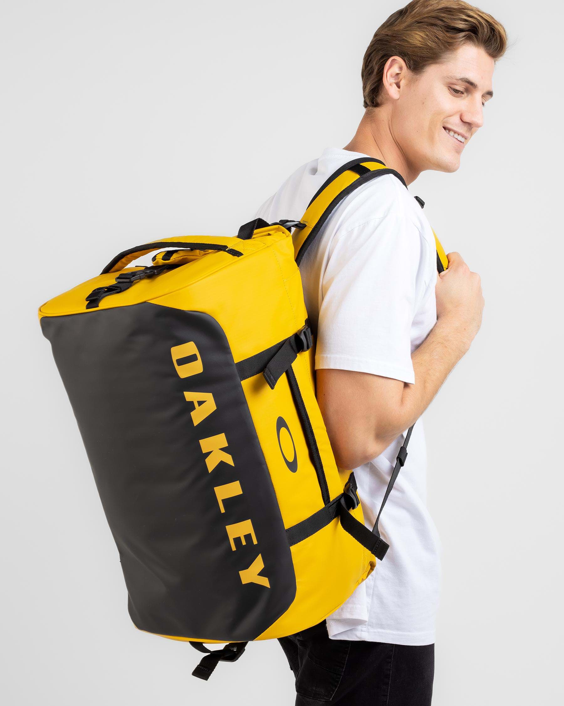 Oakley Road Trip RC 50L Duffle Bag In Amber Yellow | City Beach Australia