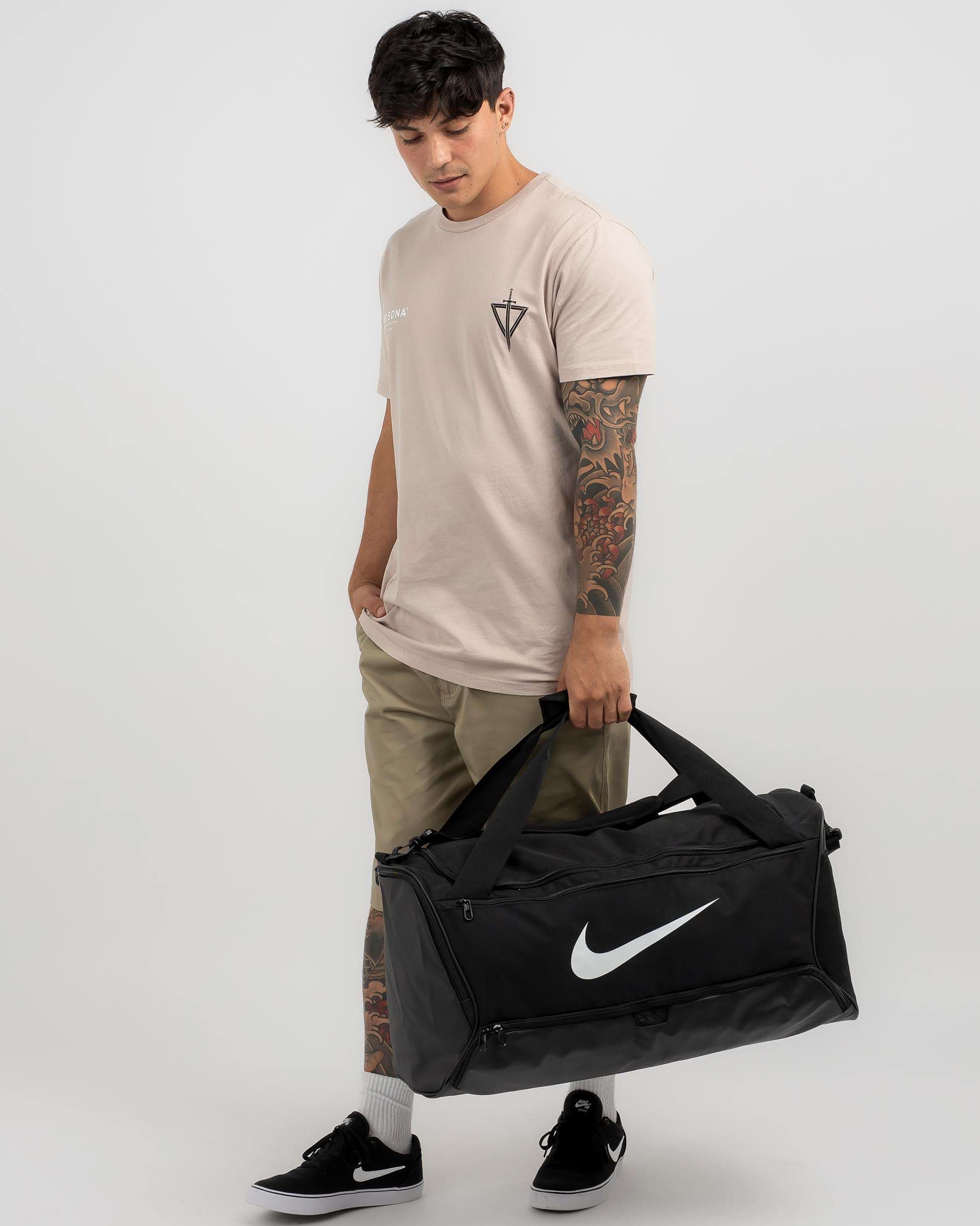Shop Nike Brasilia 9.5 Duffle Bag In Black/black/white - Fast Shipping ...