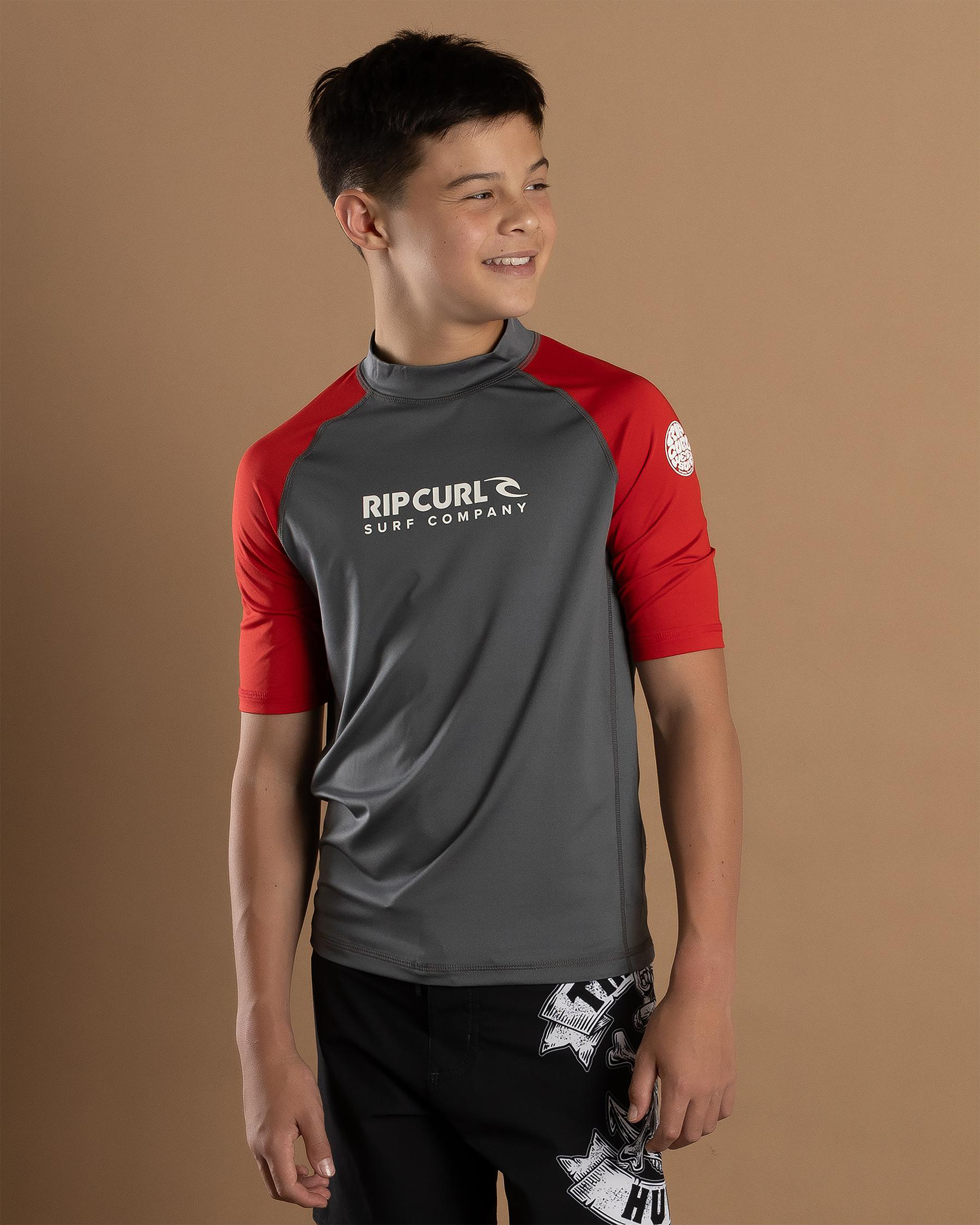 Shop Rip Curl Boys' Shock Short Sleeve Rash Vest In Red Fast Shipping