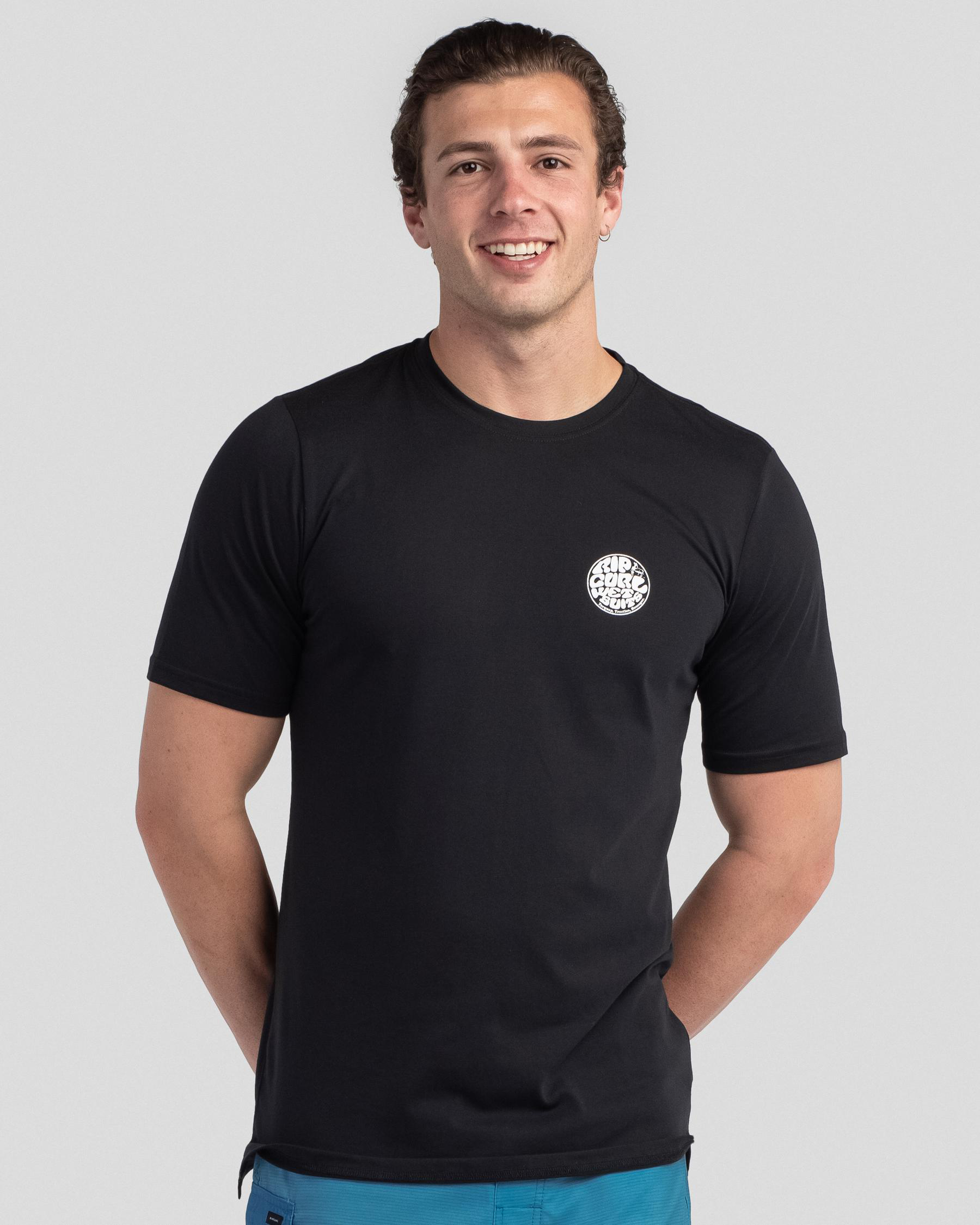 Shop Rip Curl Wettie Logo Short Sleeve UV Wet Shirt In Black - Fast ...