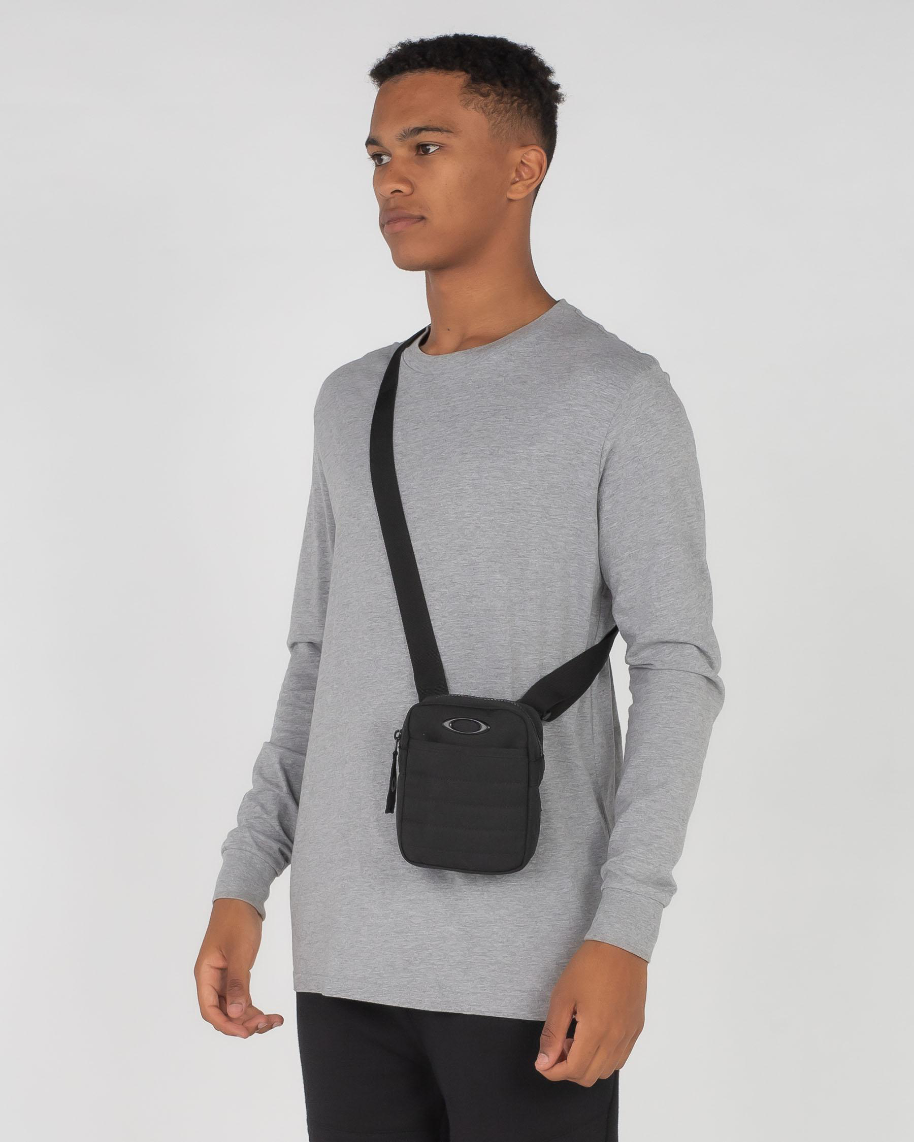 Shop Oakley Enduro Small Shoulder Bag In Blackout - Fast Shipping ...