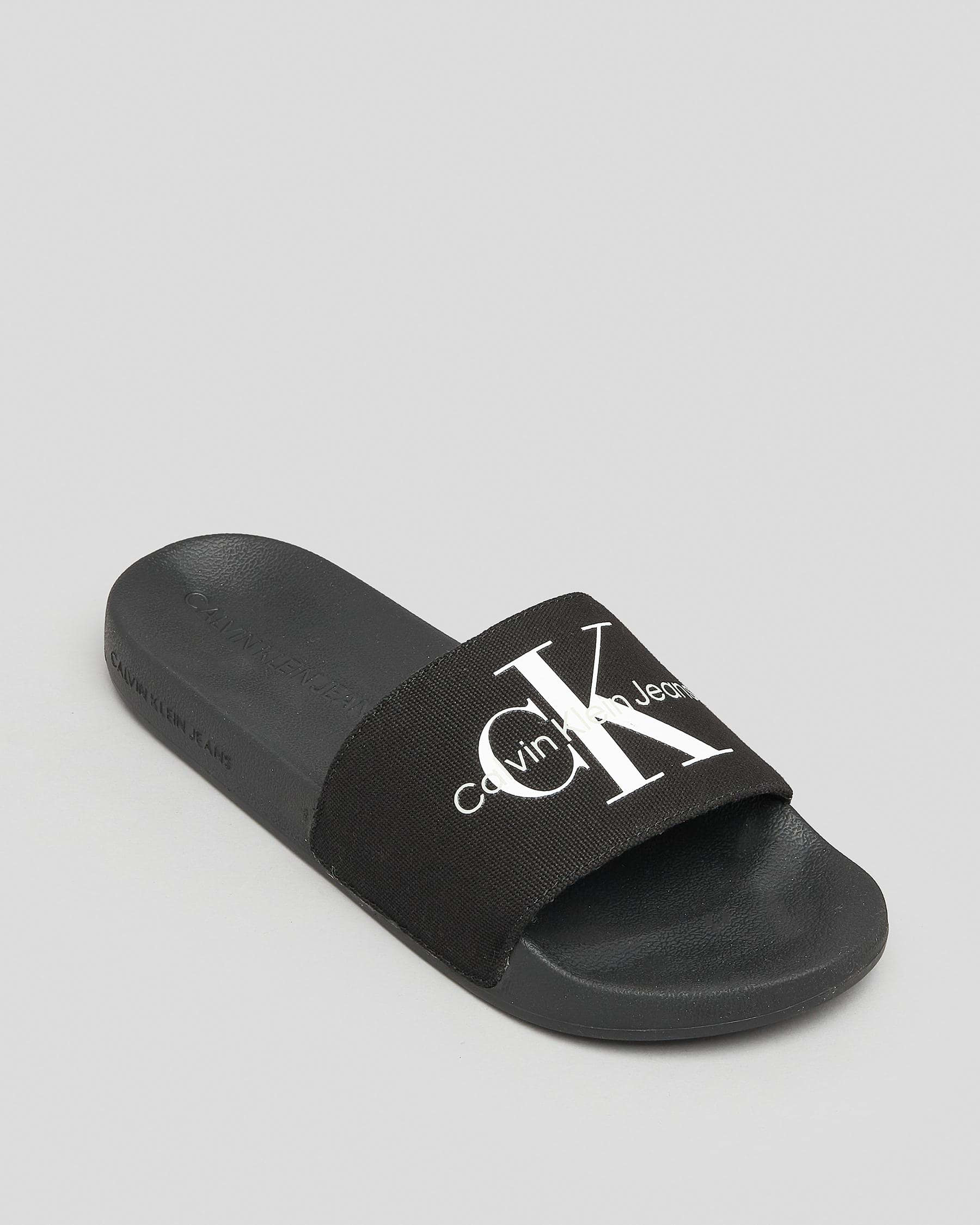 Shop Calvin Klein Slide Monogram CO In Black - Fast Shipping & Easy ...