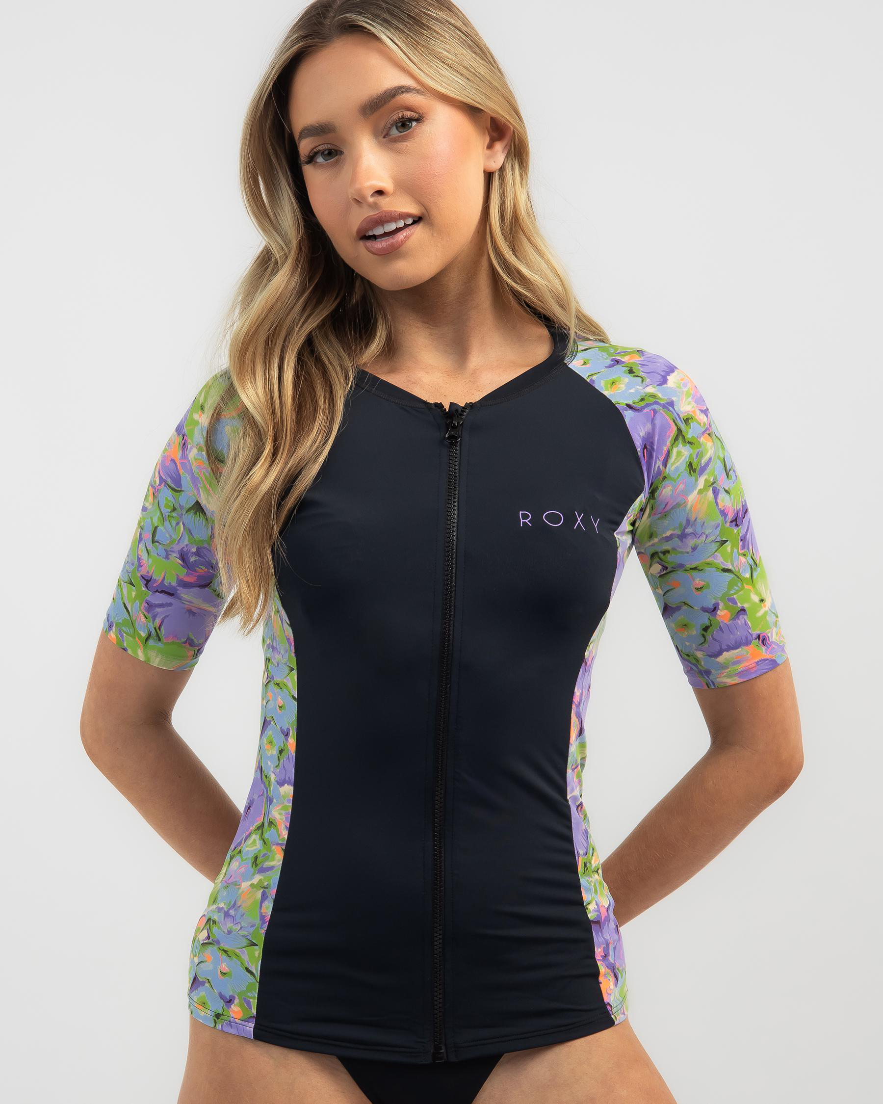 Shop Roxy New Short Sleeved Zip Through Rash Vest In Purple Rose Blumen