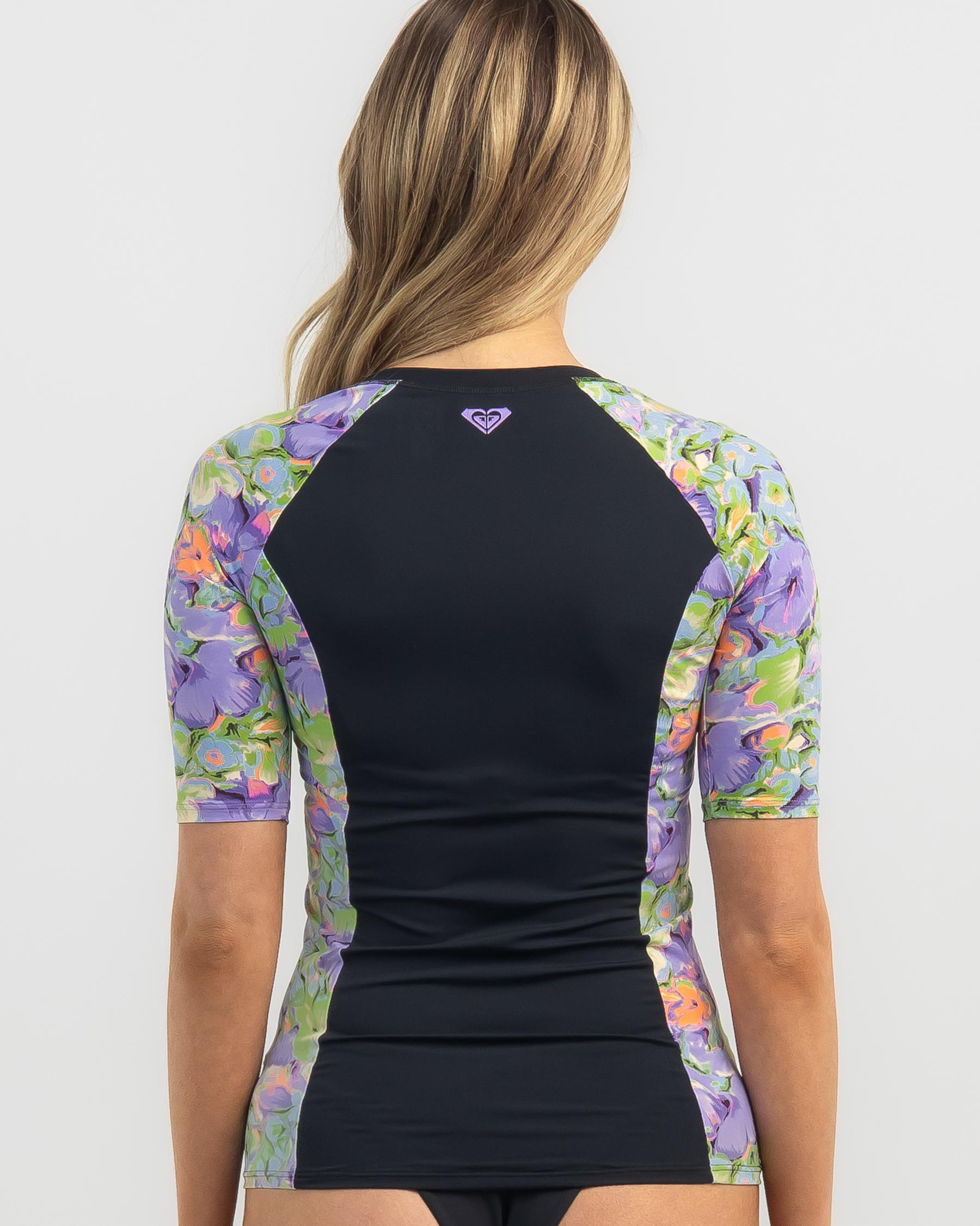 Shop Roxy New Short Sleeved Zip Through Rash Vest In Purple Rose Blumen