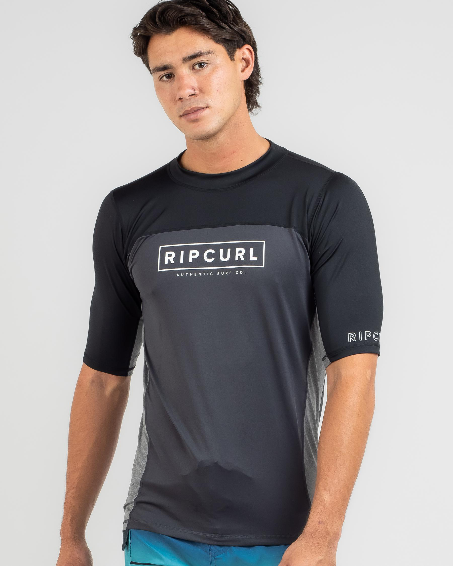 Shop Rip Curl Drive Relaxed Fit Short Sleeve Rash Vest In Black Fast