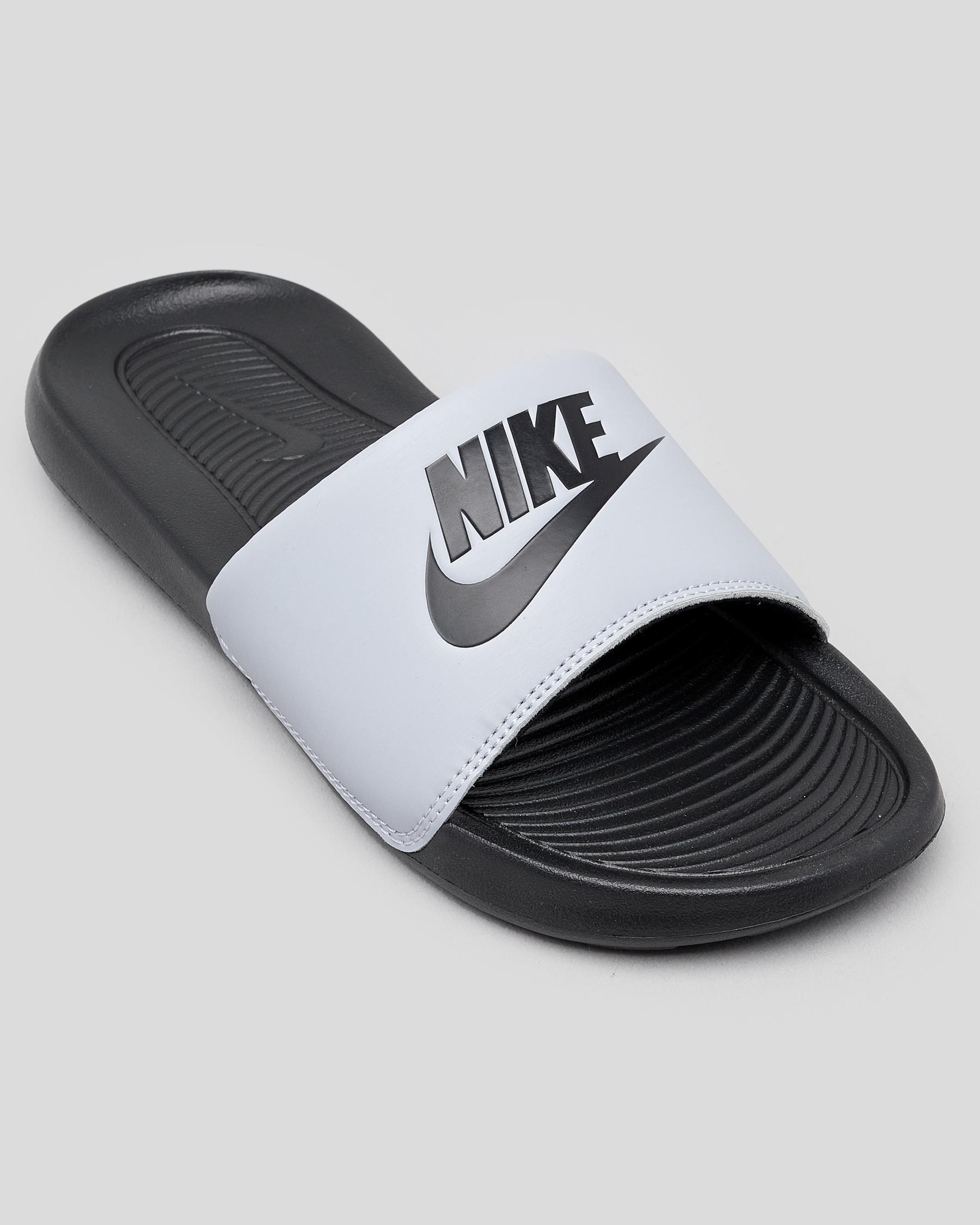 boys black nike slides