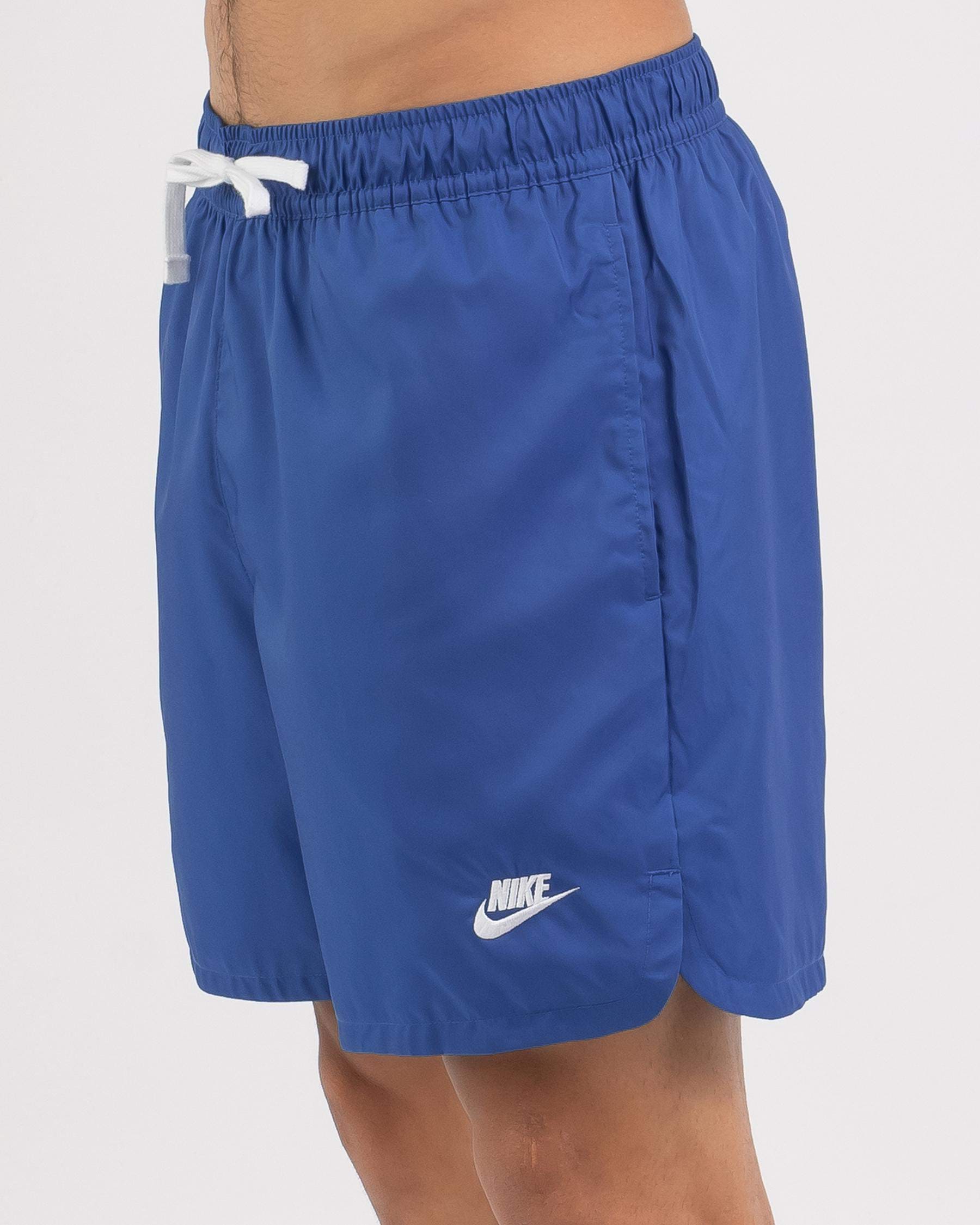 Shop Nike Sportwear Woven Flow Shorts In Dark Marina Bluewhite Fast