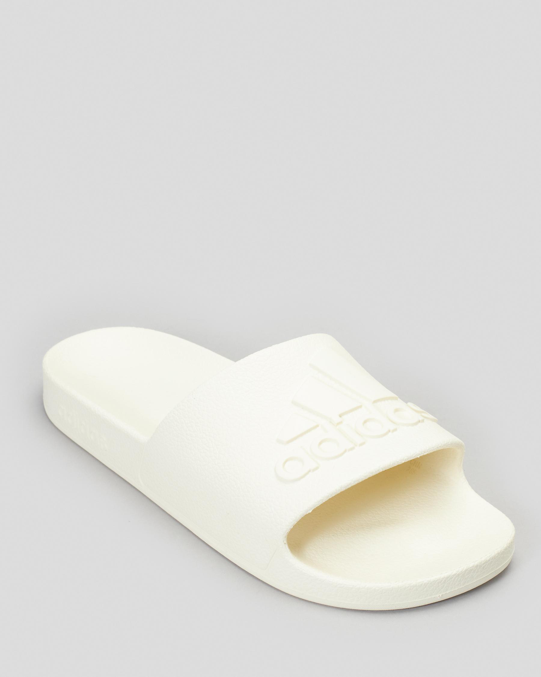 Shop adidas Adilette Aqua Slides In Off White/off White/off White
