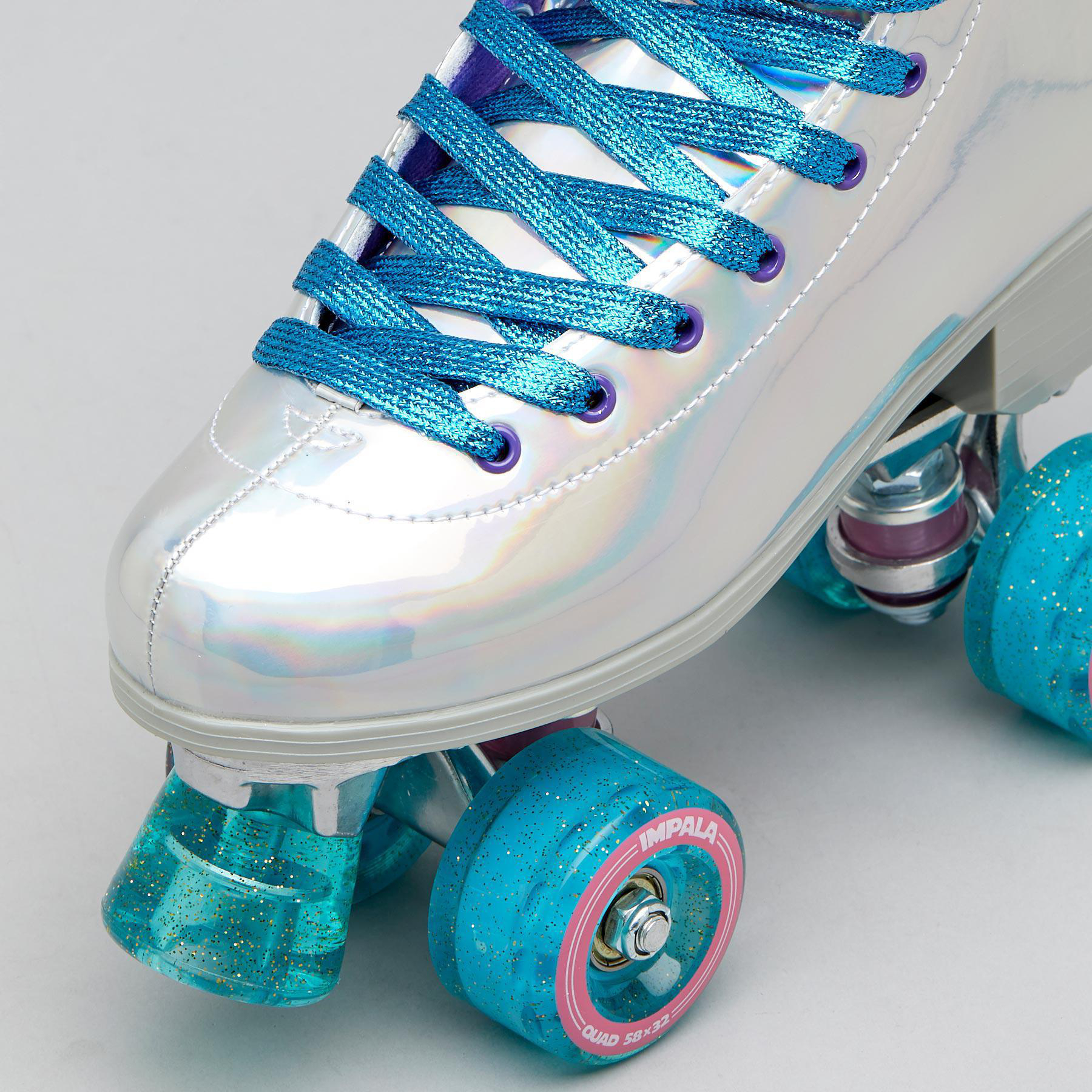 Shop Impala Impala Quad Rollerskates In Holographic Fast Shipping