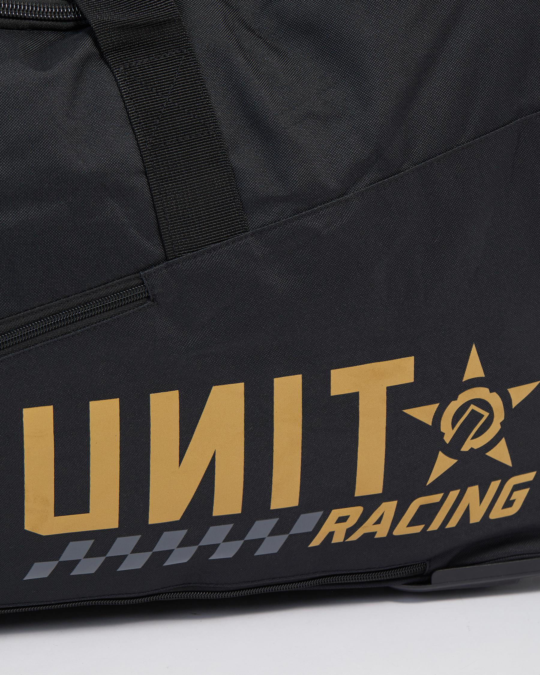 Shop Unit Racing Gear Travel Bag In Black - Fast Shipping & Easy ...