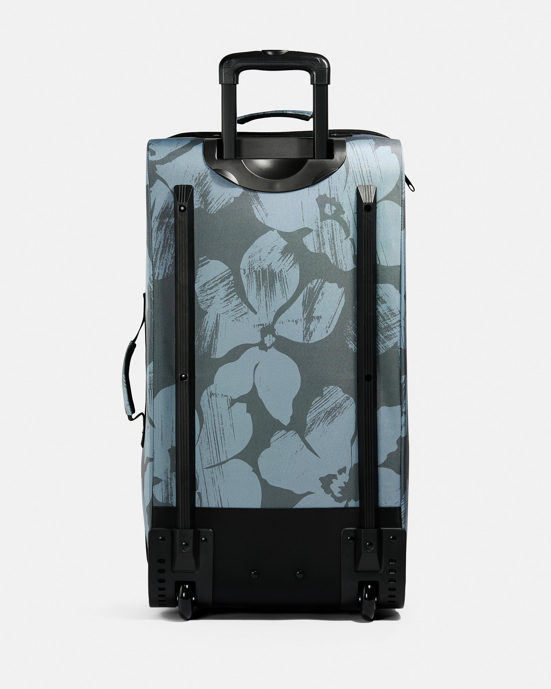Shop Volcom Patch Attack Large Wheeled Travel Bag In Blue - Fast